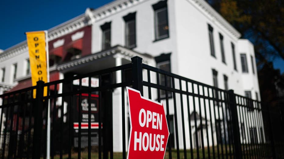 open house sign in front of home