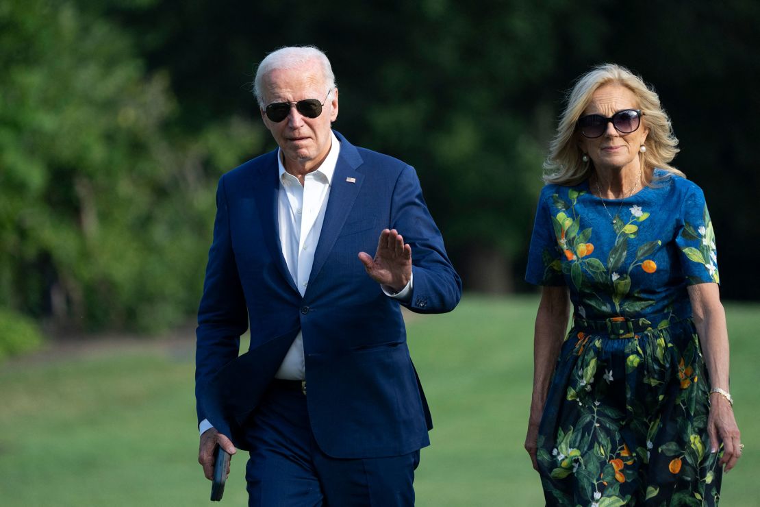 President Joe Biden and First lady Jill Biden walk to the White House in Washington, DC, on July 7, as they return after attending campaign events in Pennsylvania.